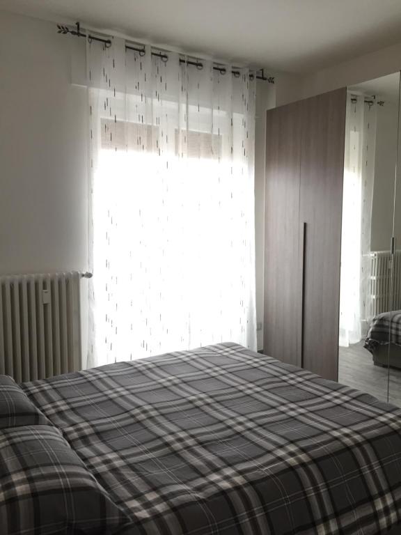 Posteľ alebo postele v izbe v ubytovaní La Gufetta