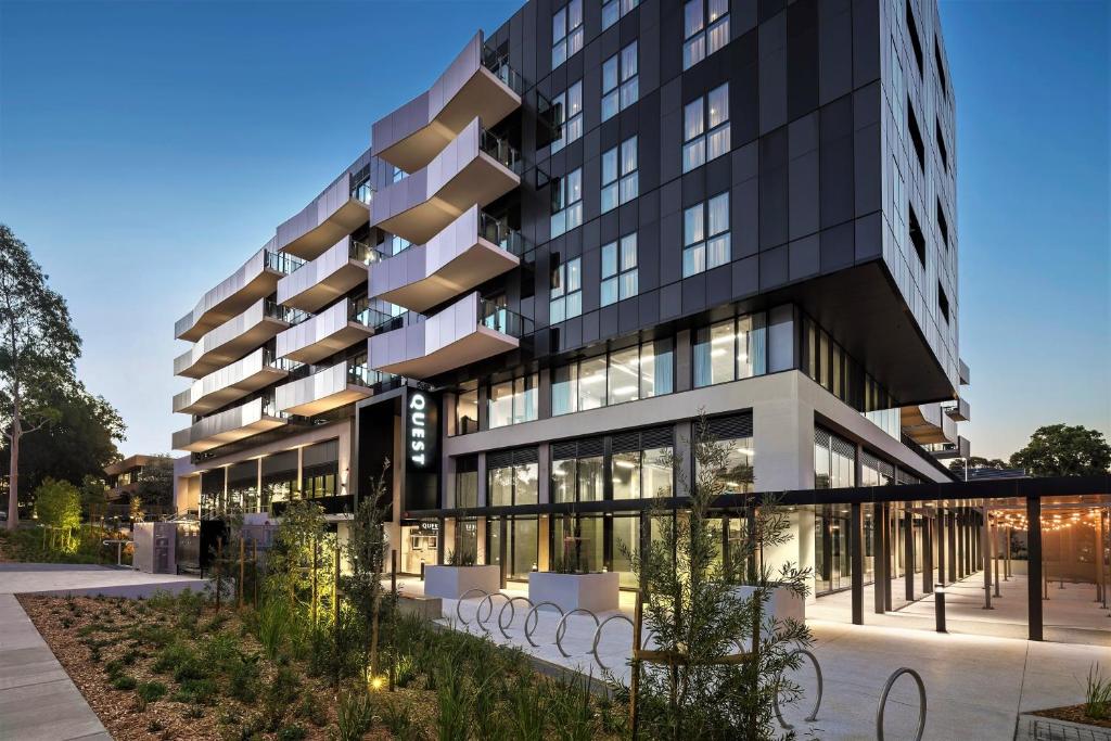 a tall black building with a lot of windows at Quest Burwood East in Burwood