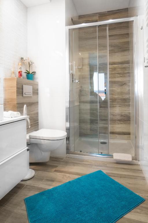 Kúpeľňa v ubytovaní Unique Apartments - Browar Gdański