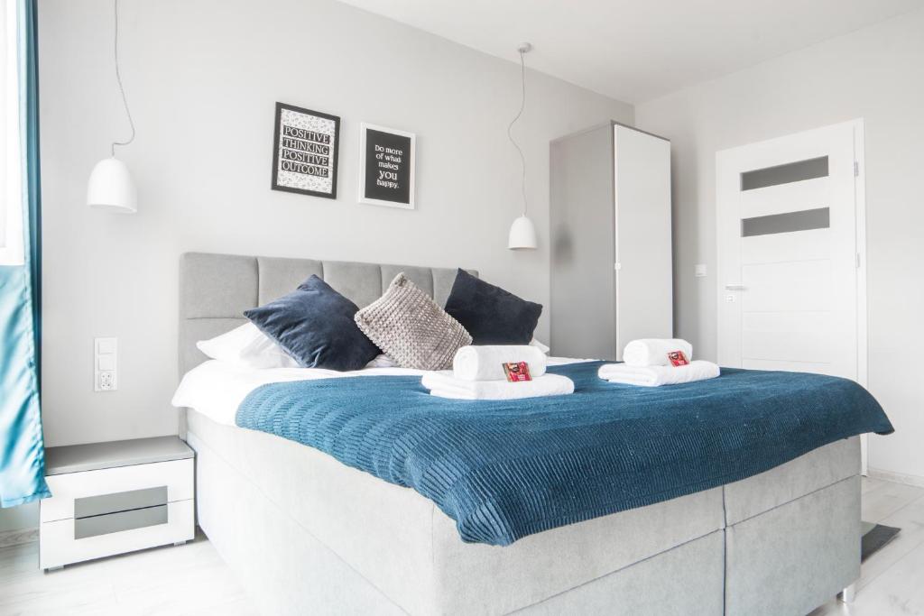 Posteľ alebo postele v izbe v ubytovaní Unique Apartments - Browar Gdański