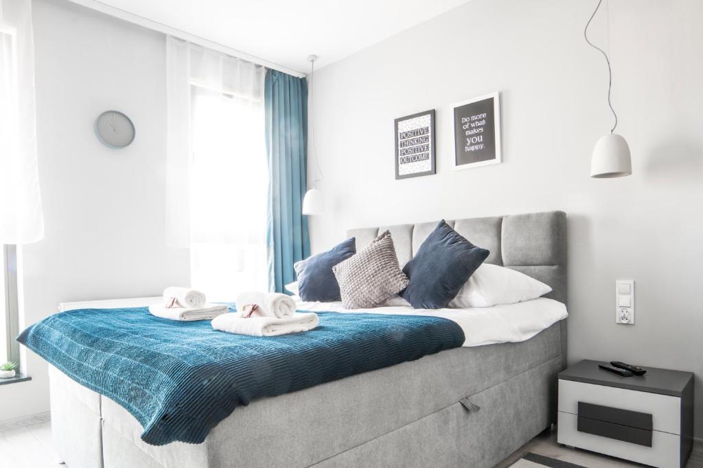 Posteľ alebo postele v izbe v ubytovaní Unique Apartments - Browar Gdański