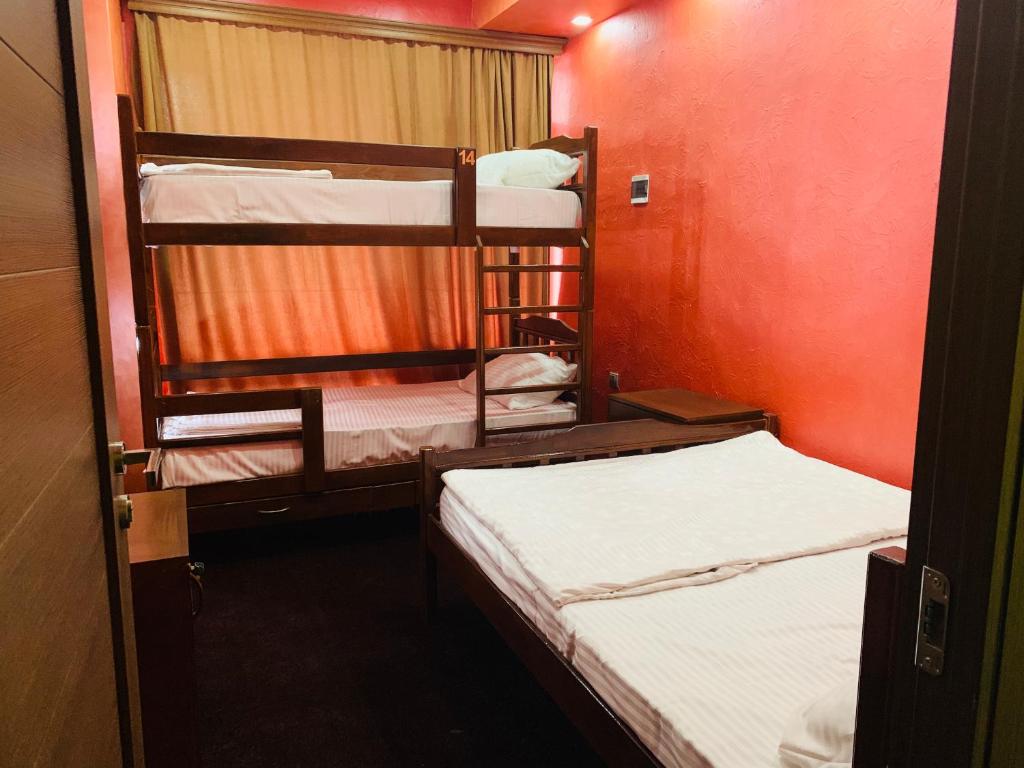 Postel nebo postele na pokoji v ubytování HOTEL N1