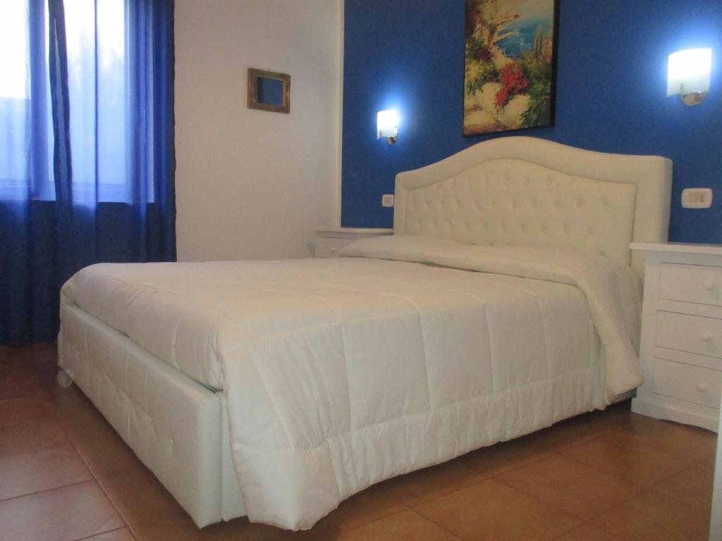 Posteľ alebo postele v izbe v ubytovaní Palinuro casa vacanze "Donna Antonia"