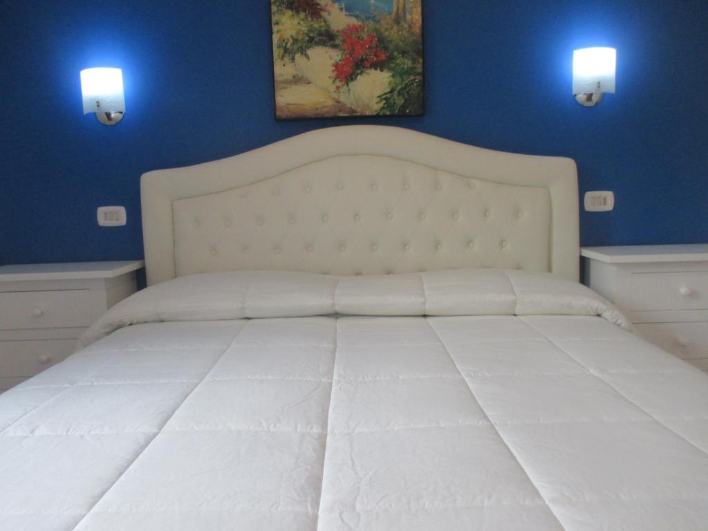 Posteľ alebo postele v izbe v ubytovaní Palinuro casa vacanze "Donna Antonia"