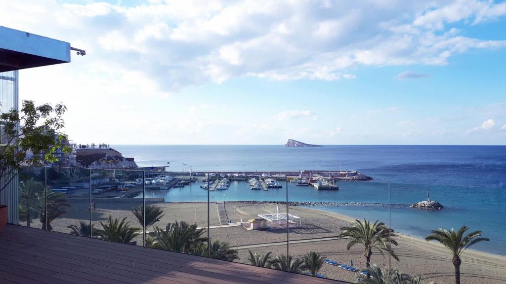 a view of a marina with boats in the water at Hotel Montemar in Benidorm