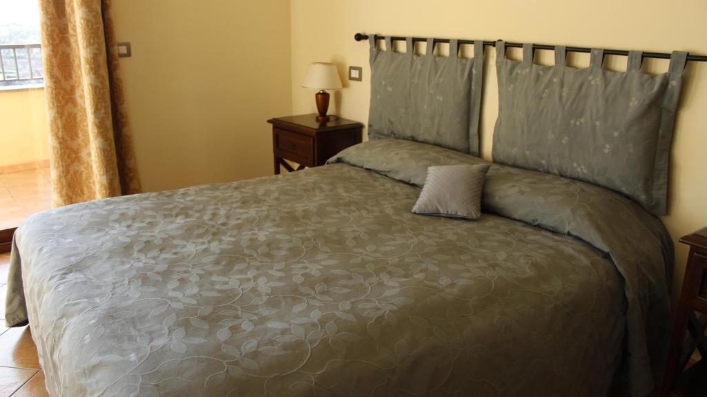 Postel nebo postele na pokoji v ubytování Residence Hotel La Commenda