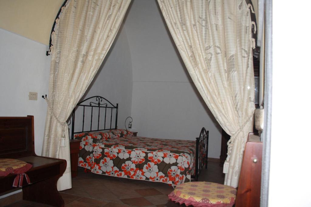 Postel nebo postele na pokoji v ubytování Dammusi Mueggen