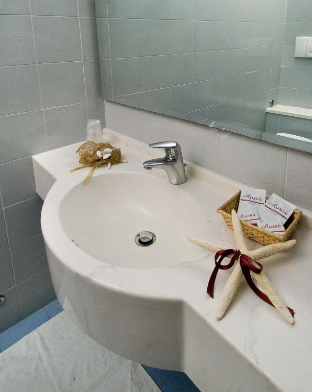 Koupelna v ubytování Hotel Alba
