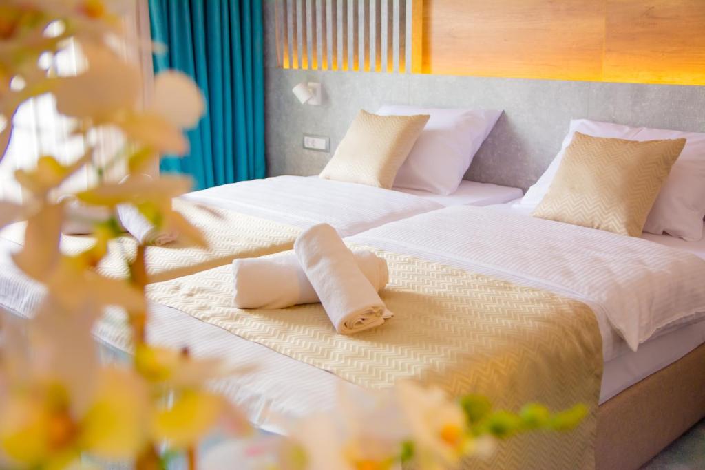 Postel nebo postele na pokoji v ubytování Hotel Nota
