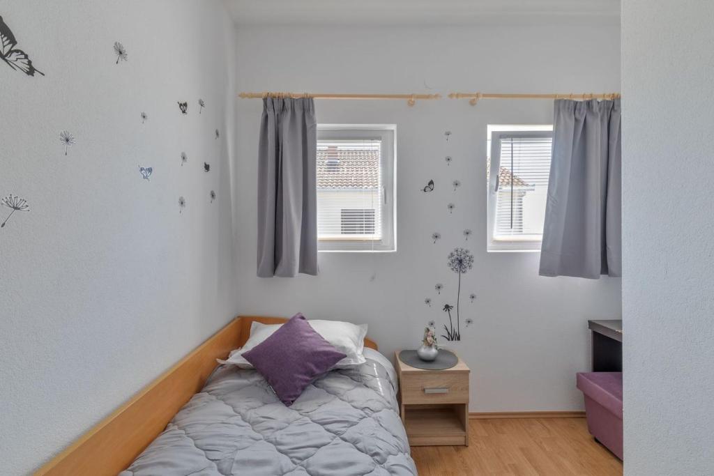 Posteľ alebo postele v izbe v ubytovaní Apartment Neretva dream