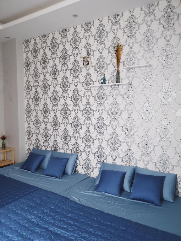 Voodi või voodid majutusasutuse Mochi's Home toas
