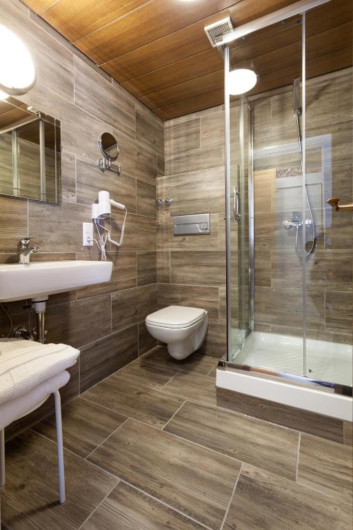 Koupelna v ubytování Hotel Petra