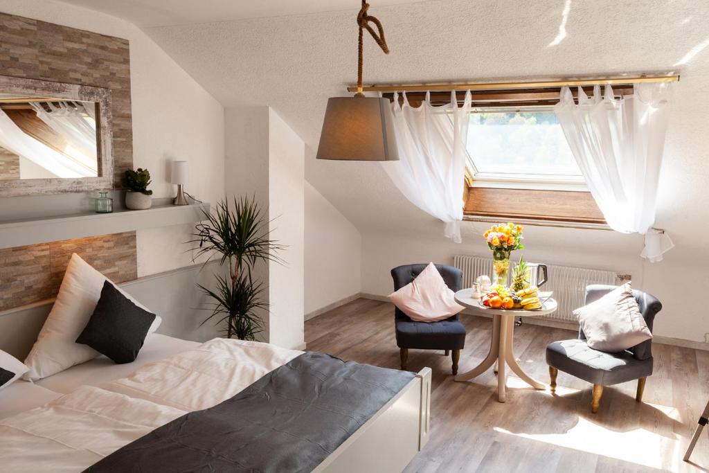 Postel nebo postele na pokoji v ubytování Hotel Petra