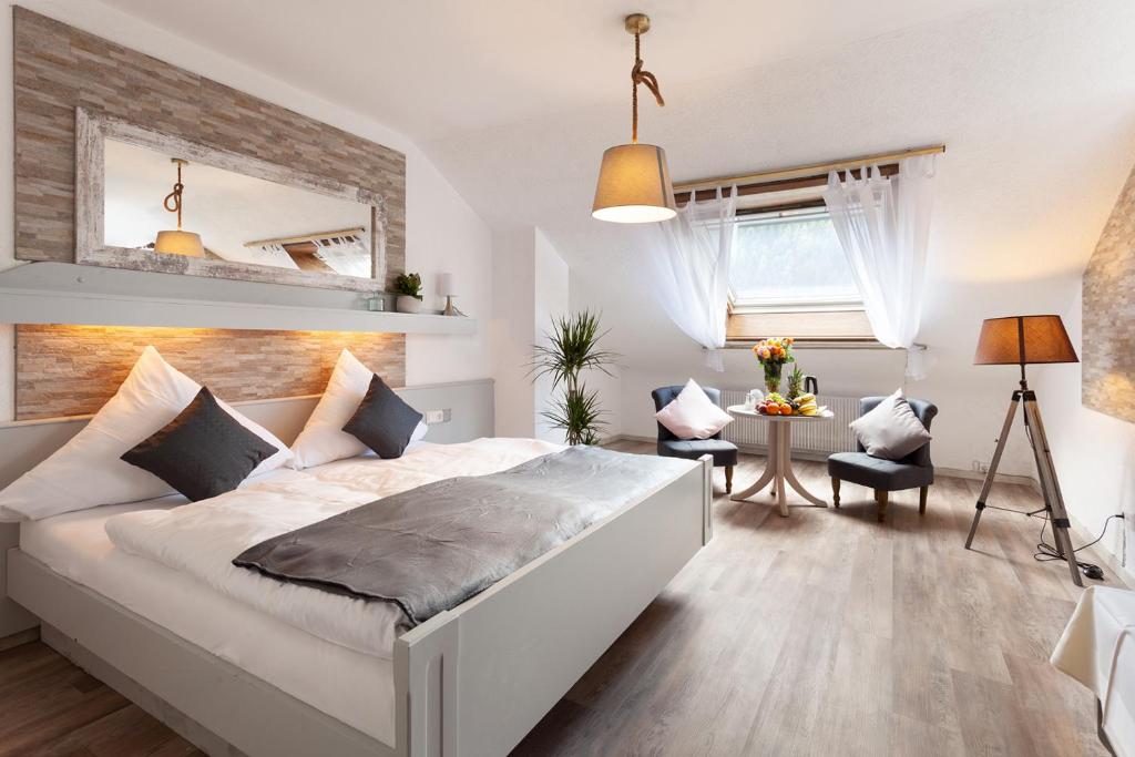Postel nebo postele na pokoji v ubytování Hotel Petra