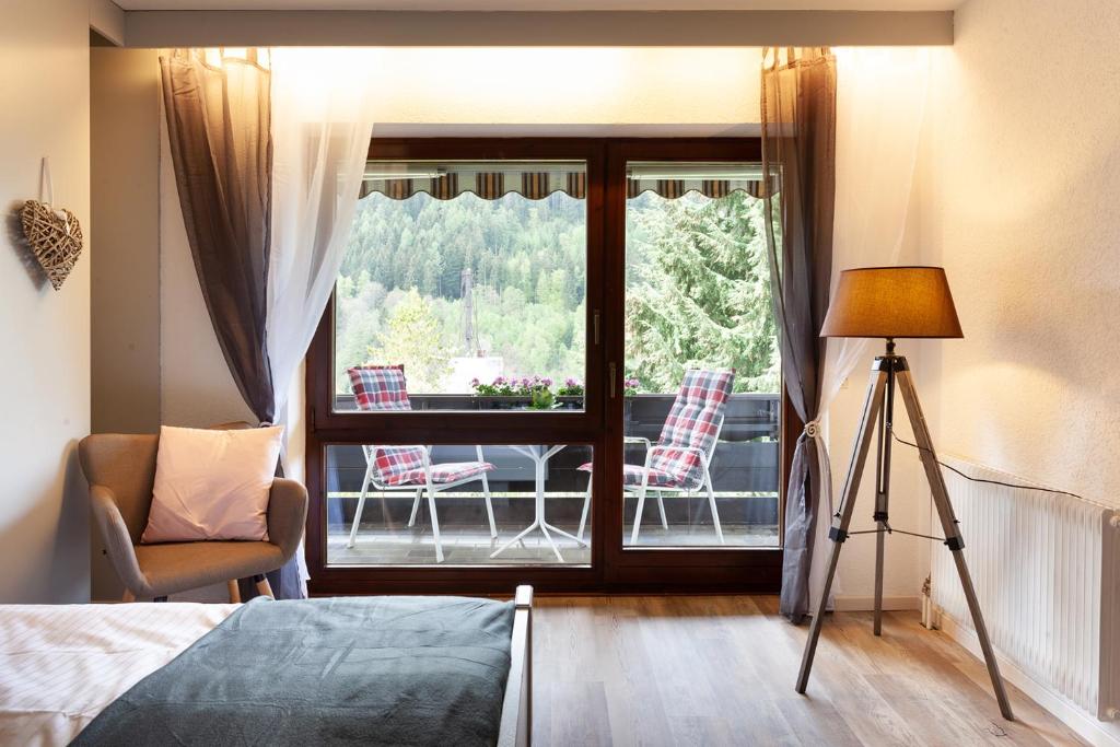Postel nebo postele na pokoji v ubytování Hotel Petra