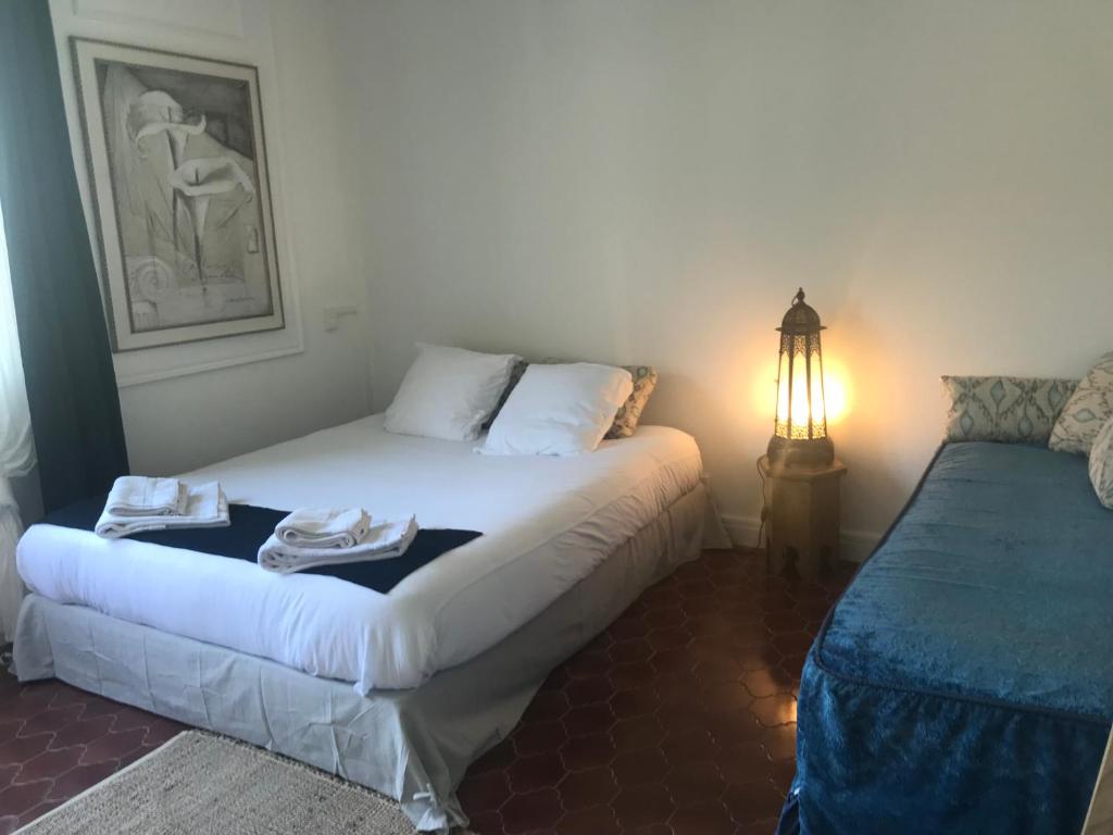Postel nebo postele na pokoji v ubytování MOODz HOTEL VIENNE