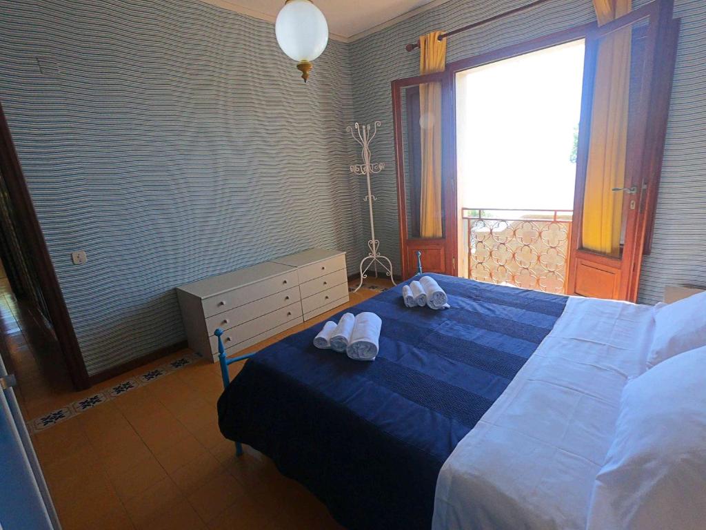 Postel nebo postele na pokoji v ubytování Ammiraglio