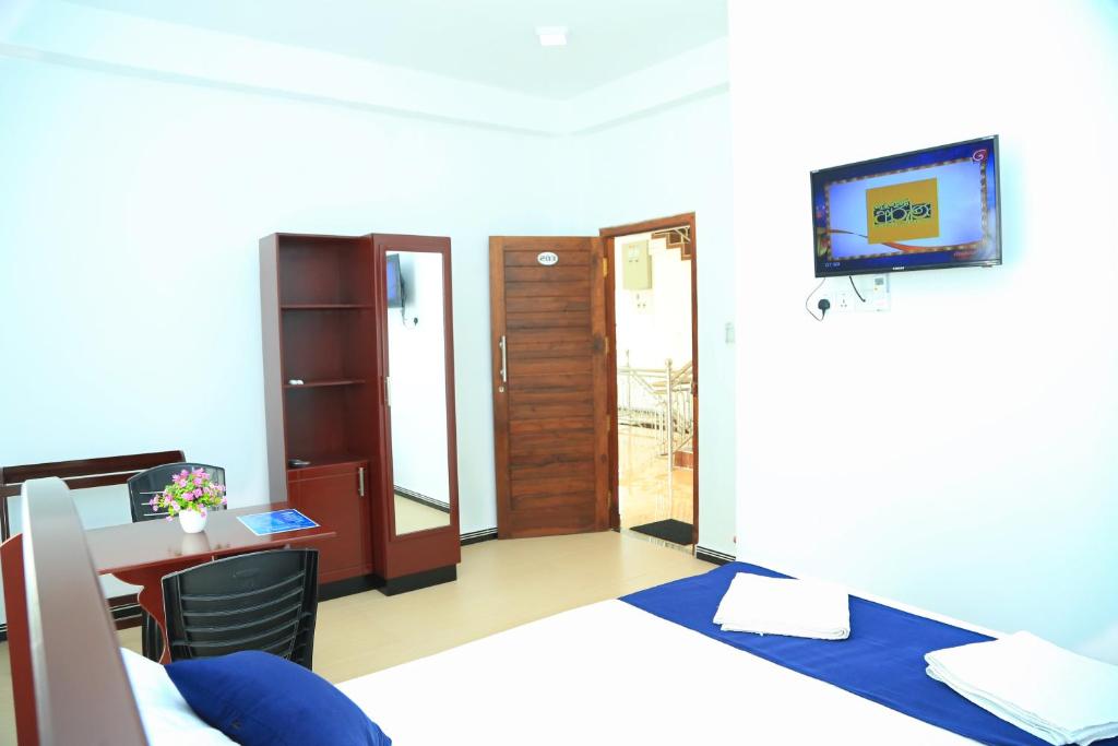 Postel nebo postele na pokoji v ubytování Blue Diamond Resort