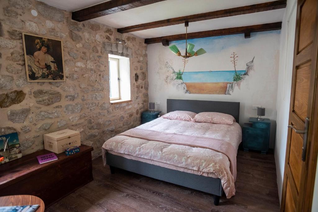 Postel nebo postele na pokoji v ubytování Guesthouse NINA