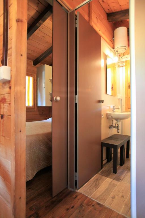 Postel nebo postele na pokoji v ubytování Camping Bella Sardinia
