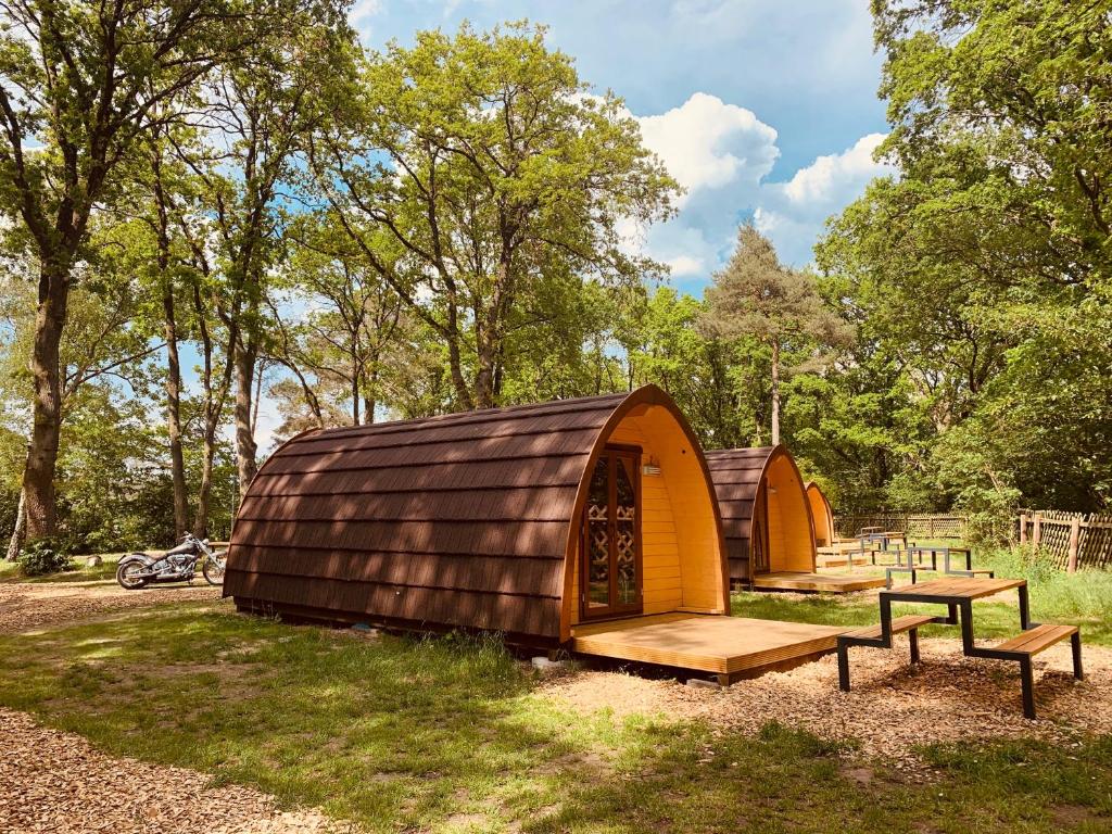 a yurt with a bench and a picnic table at Erholungsgebiet Blauer See in Garbsen