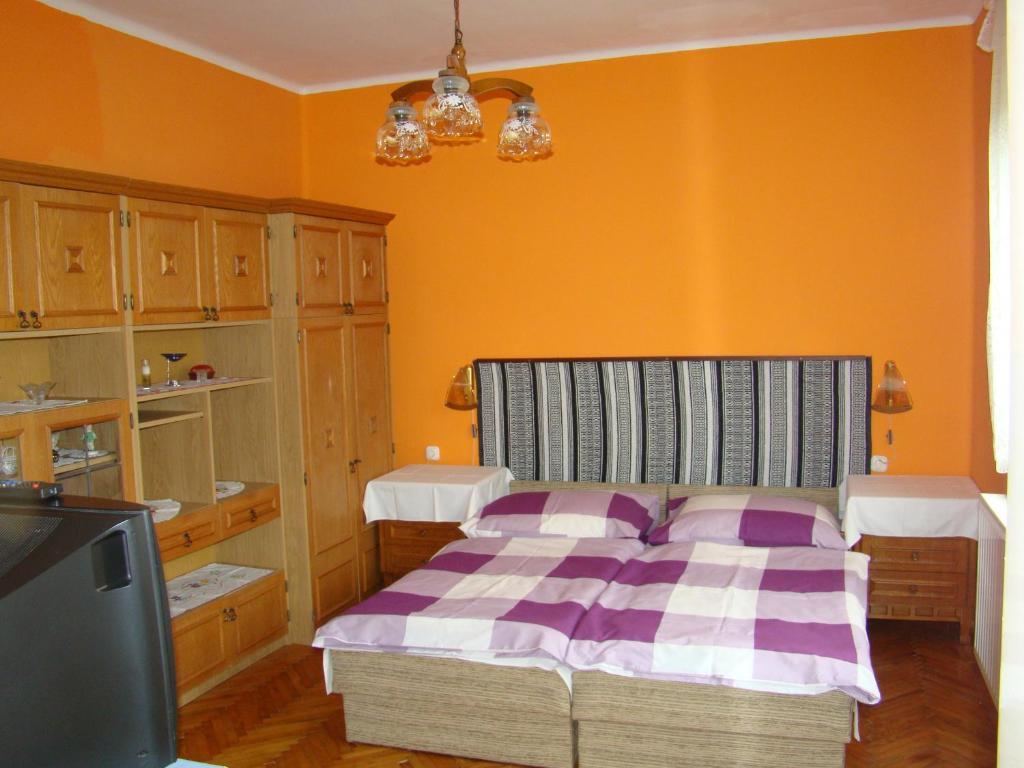 Postel nebo postele na pokoji v ubytování Székely Apartman