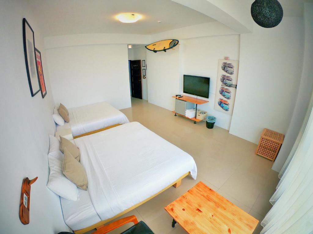 TV a/nebo společenská místnost v ubytování Imanuel Surfing B&B