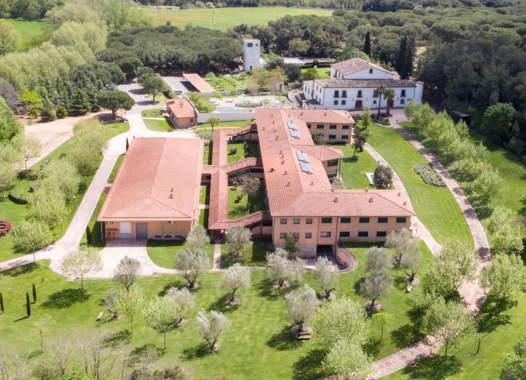 an aerial view of a building with a yard at Casa Santa Elena in Santa Cristina d'Aro