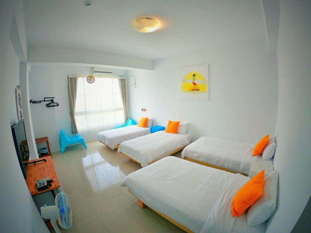 Postel nebo postele na pokoji v ubytování Imanuel Surfing B&B