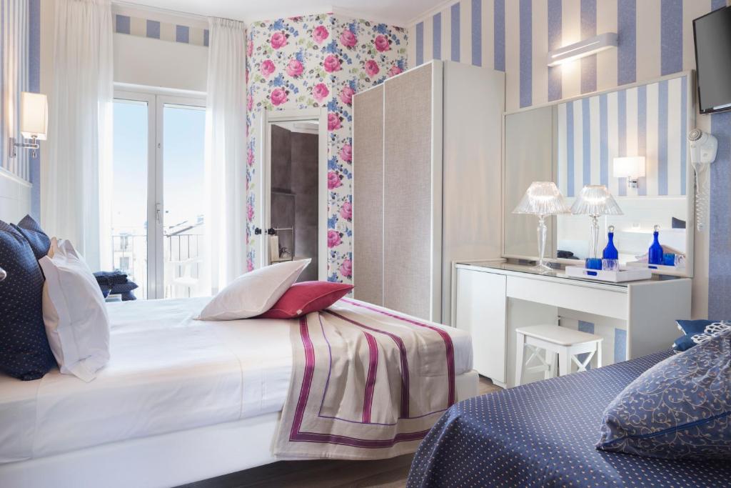 Postel nebo postele na pokoji v ubytování Hotel Atlantic Riviera Mare