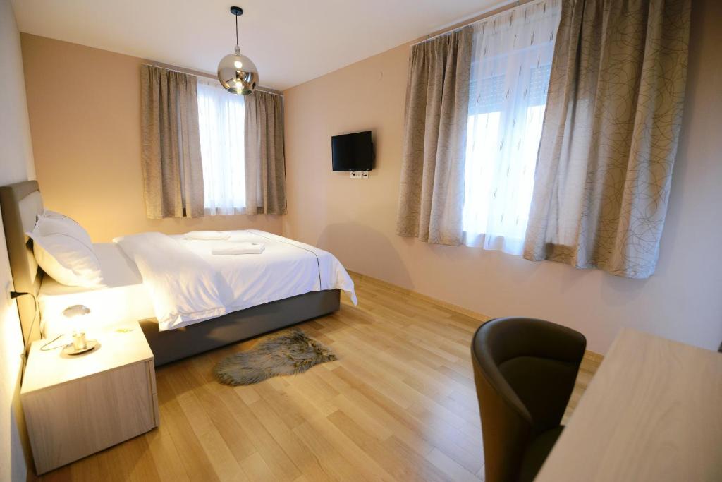 Postel nebo postele na pokoji v ubytování Zoilo Rooms self check-in