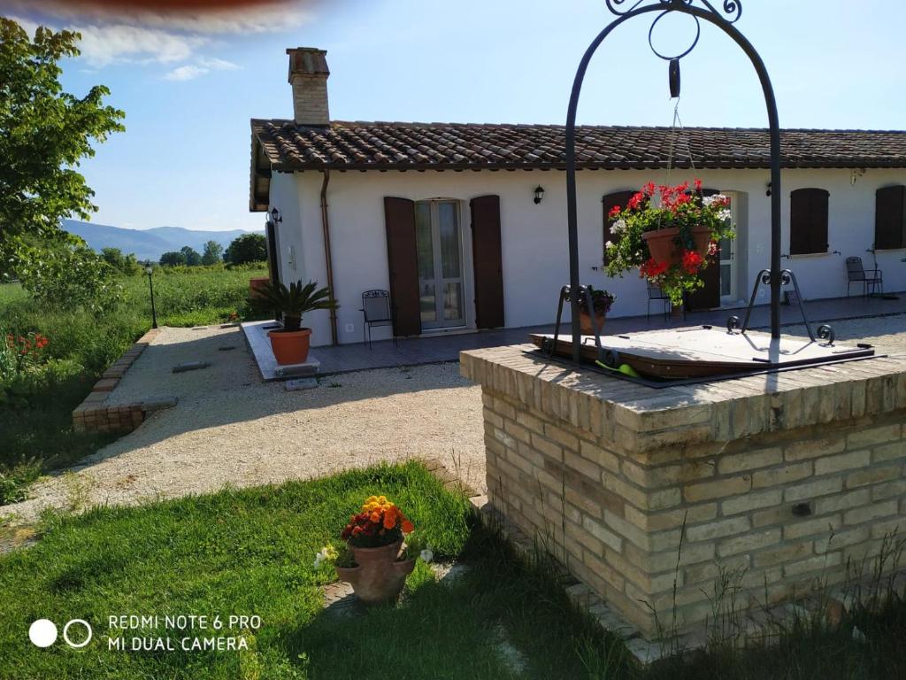 Zahrada ubytování AGRITURISMO " LE SERRE"