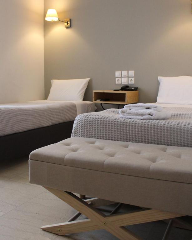 Posteľ alebo postele v izbe v ubytovaní Messini Hotel