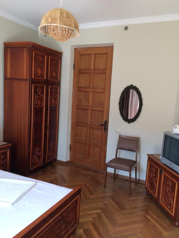 Postel nebo postele na pokoji v ubytování Cozy Guest House in Old Batumi