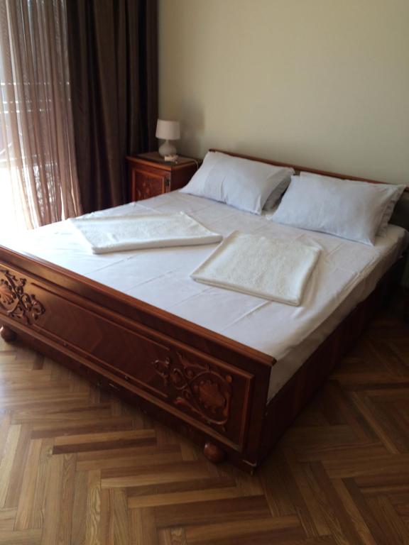 Postel nebo postele na pokoji v ubytování Cozy Guest House in Old Batumi