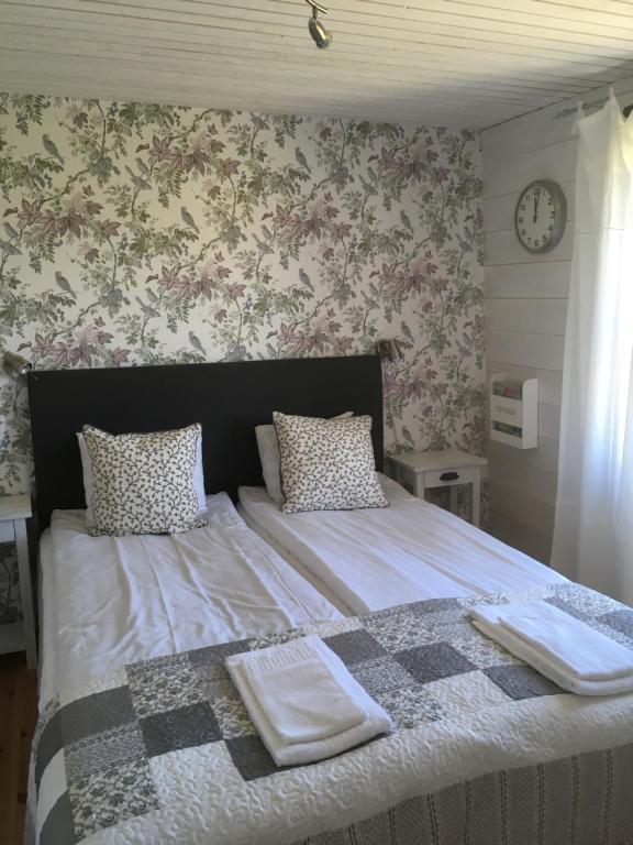 Postel nebo postele na pokoji v ubytování Brogård