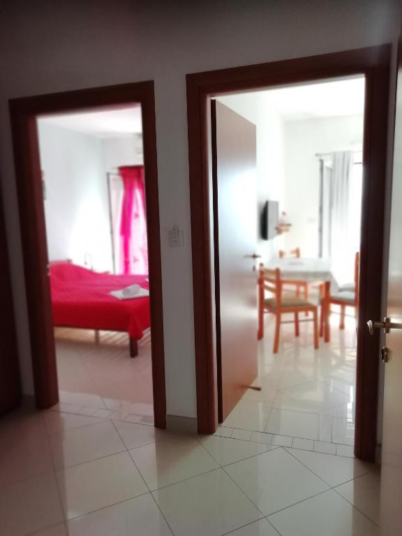 Postel nebo postele na pokoji v ubytování Villa Kubo