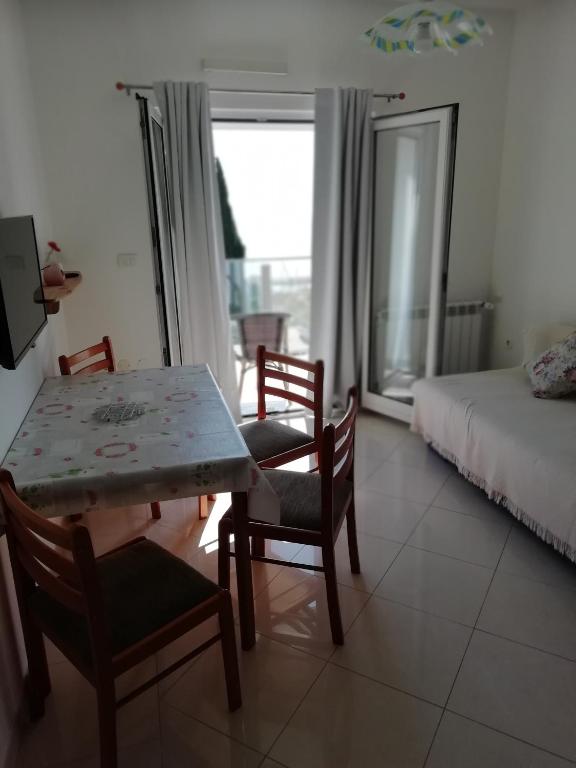 Postel nebo postele na pokoji v ubytování Villa Kubo