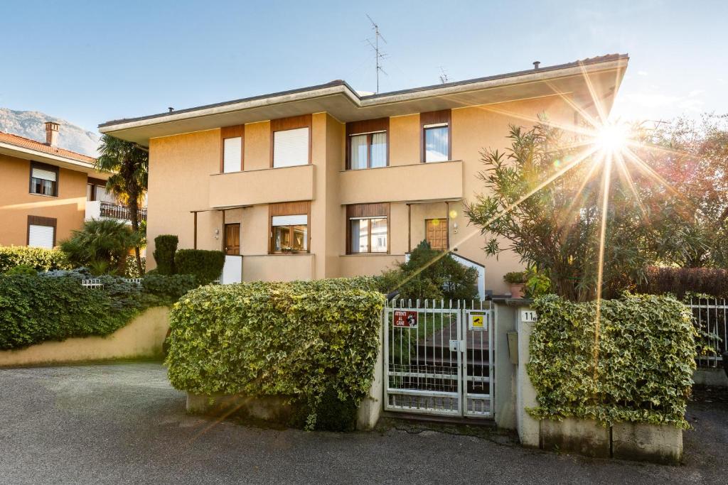 a house with a gate in front of it at VILLA MARY in Arco