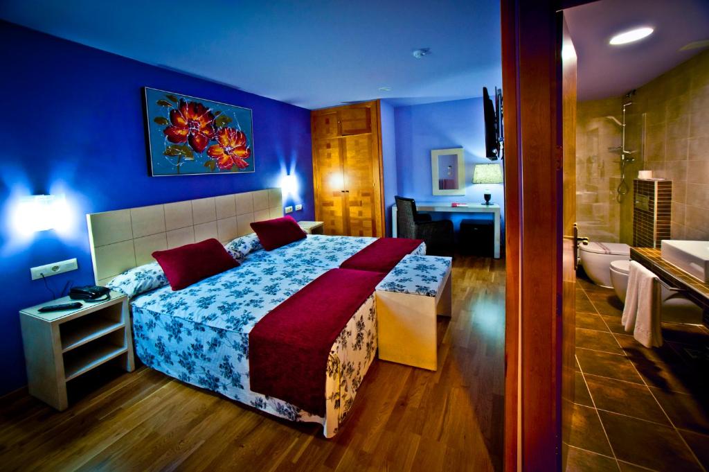 Postel nebo postele na pokoji v ubytování Hotel Condes de Castilla