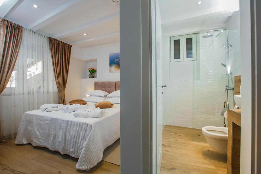 Postel nebo postele na pokoji v ubytování Heritage Hotel Dea Hvar