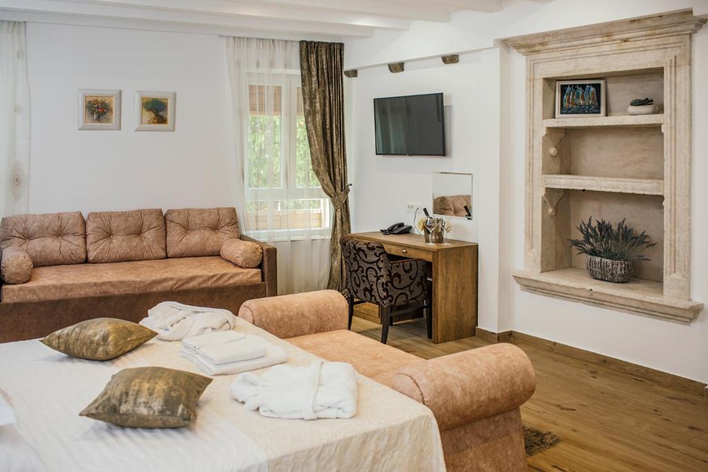TV a/nebo společenská místnost v ubytování Heritage Hotel Dea Hvar