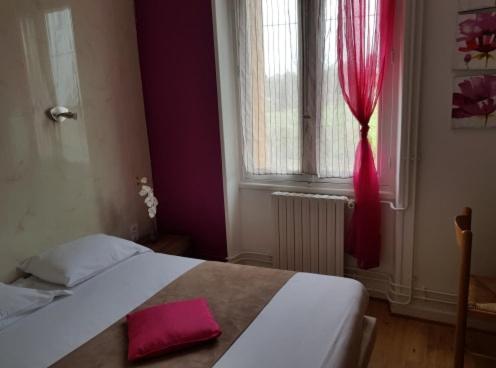 Postel nebo postele na pokoji v ubytování le relais des forêts
