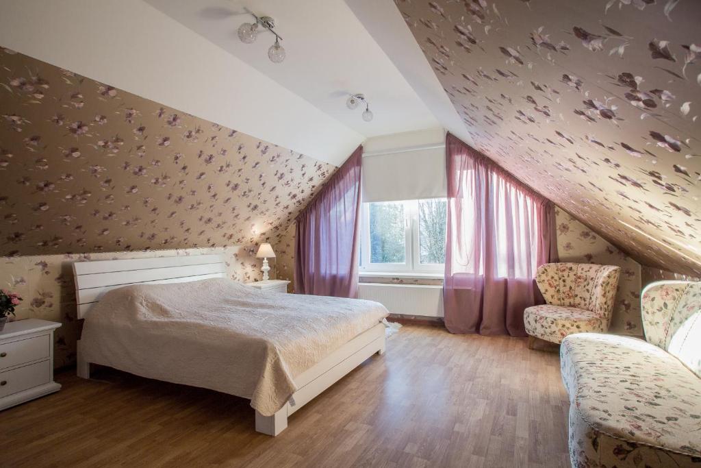 Postel nebo postele na pokoji v ubytování Pärnu Villa Harmony