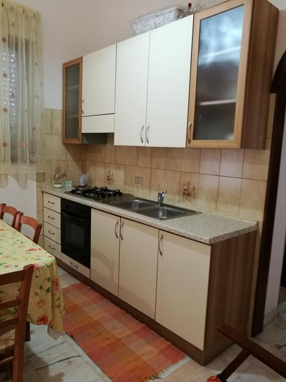 A kitchen or kitchenette at dreams on the sea