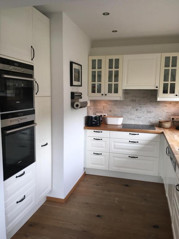 Kuchyň nebo kuchyňský kout v ubytování Apartment Hahnenkammblick