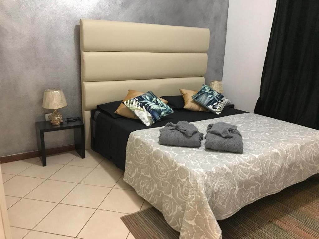 Postel nebo postele na pokoji v ubytování Blue Eagle Guesthouse - Casa de hospedes