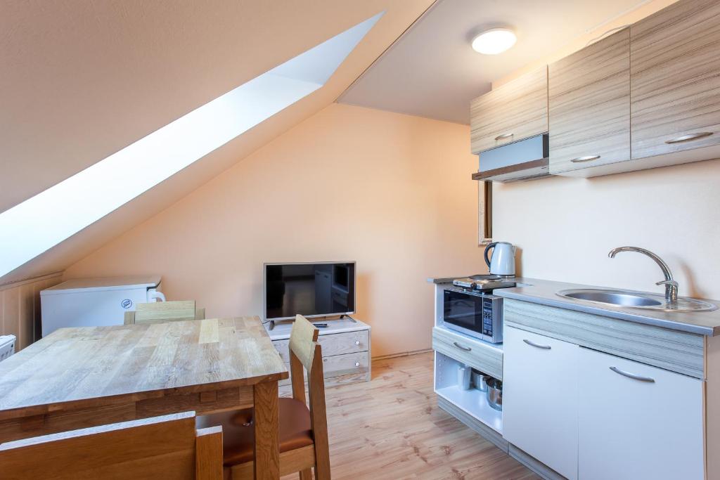 Kuchyň nebo kuchyňský kout v ubytování Pärnu Villa Harmony