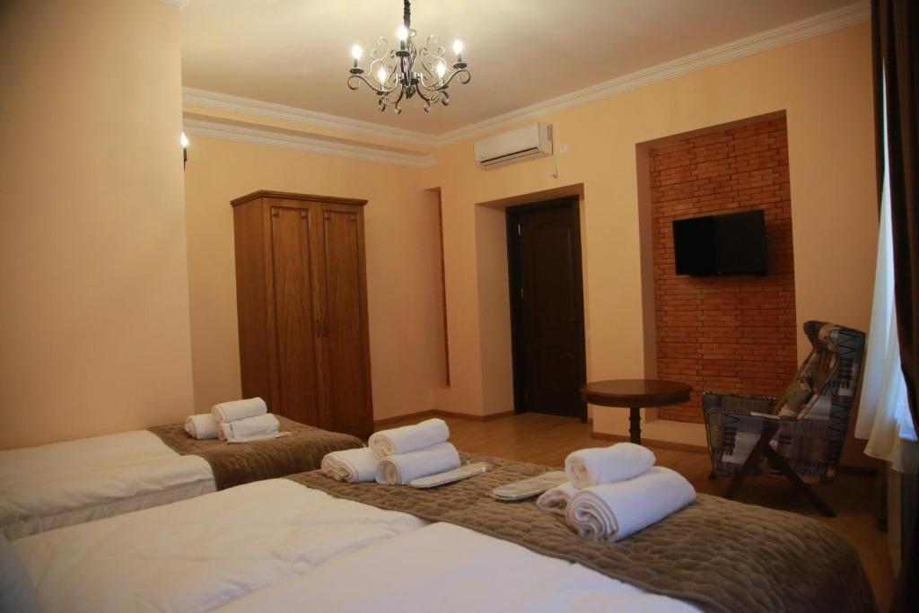Postel nebo postele na pokoji v ubytování B&B rooms