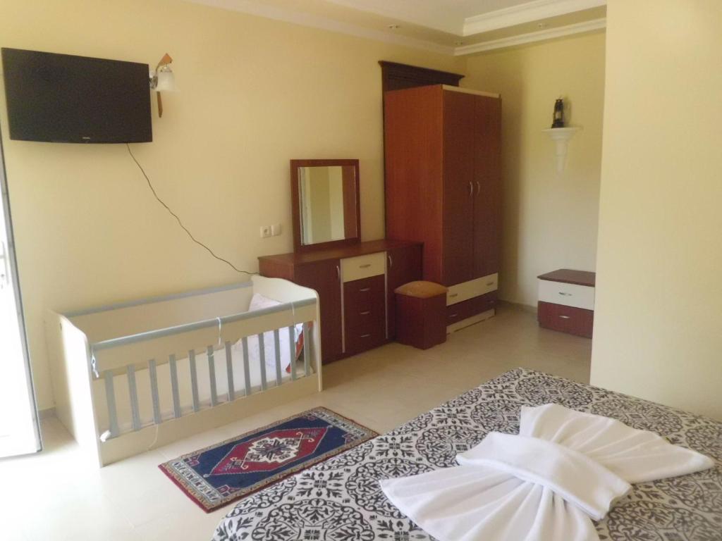 Postel nebo postele na pokoji v ubytování Merhaba Hotel